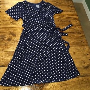 Navy blue polka dot mock wrap dress